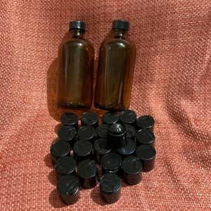 2 brown Apothecary glass jars and 22 new replacement push top lids